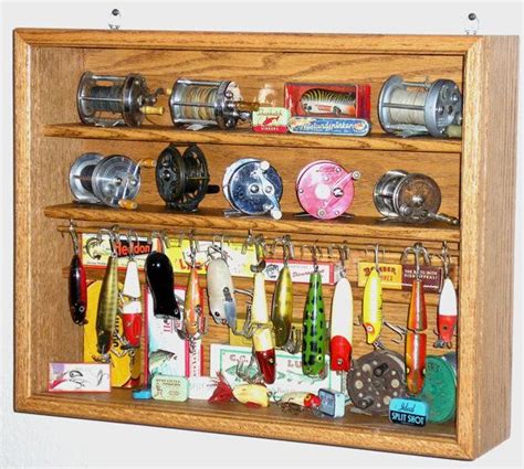 A Wooden Display Case Filled With Lots Of Different Types Of Fishing