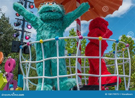 Rosita And Elmo On Colorful Float In Sesame Street Party Parade At