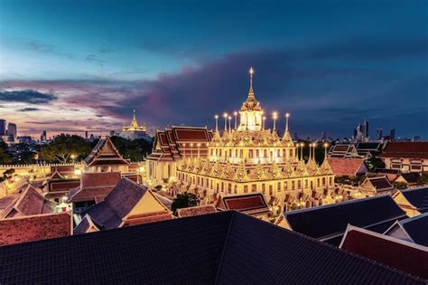 Premium Photo Golden Metal Castle Illuminated Wat Ratchanatdaram