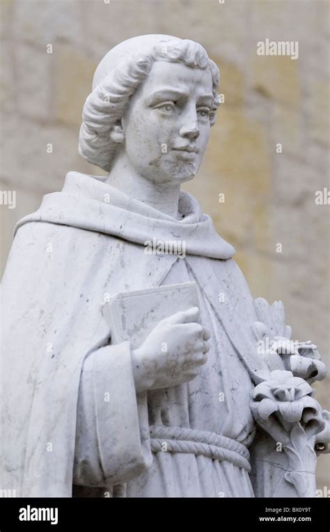 Statue of San Antonio de Padua outside the San Fernando cathedral, in the town named after him ...