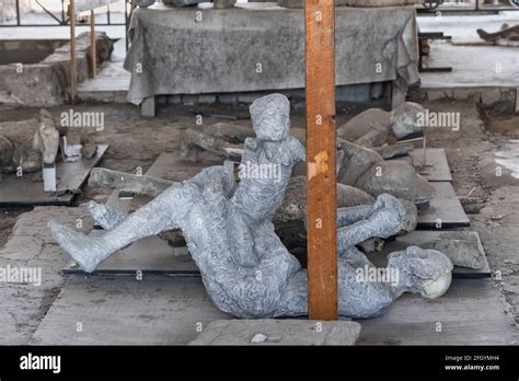 Mother with a child human body plaster cast, ancient victims of the ...