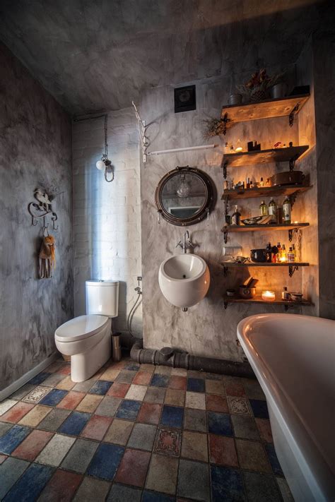 a bathroom with a toilet, sink and shelves on the wall next to a bathtub