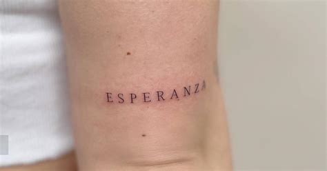 Lettering tattoo of the word "esperanza" located on the