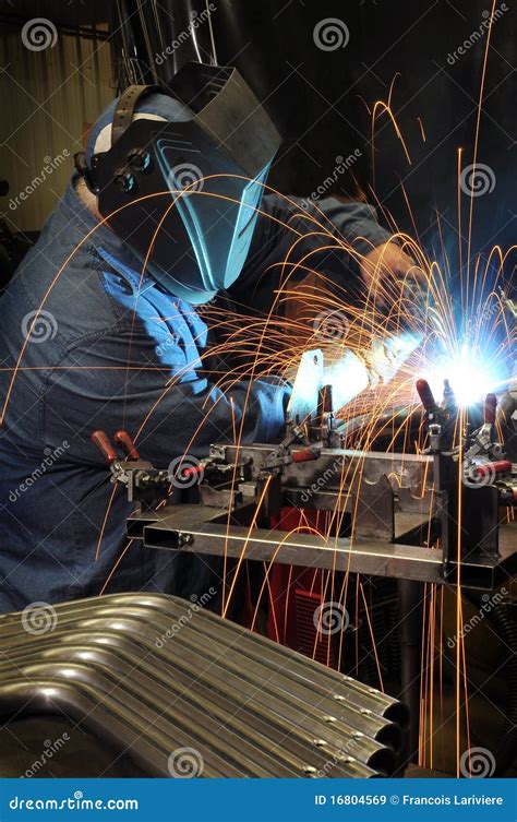 The Welder Is Welding With Shielded Metal Arc Welding SMAW Or Manual