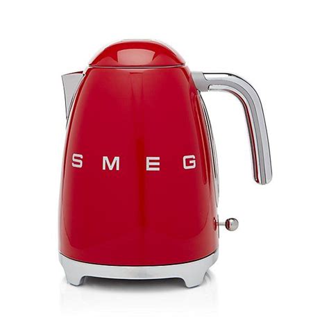 an electric kettle with the word smeg on it's front and side panels