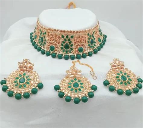 Green And Golden Alloy Crystal Bridal Imitation Jewellery Set At Rs