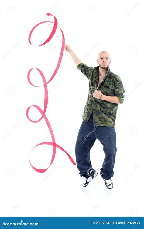 Rapper In Camouflage Jacket With Ribbon Stands On Tiptoes Stock Image