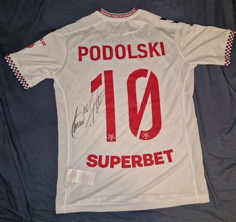 Koszulka Lukas Podolski z autografem Mikołów Licytacja na Allegro