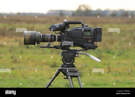 wildlife movie camera on tripod Stock Photo - Alamy