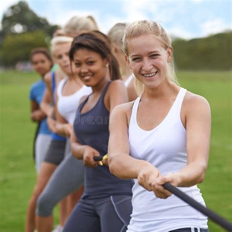 Tug Of War Women In Park With Rope For Fitness And Game Team Building