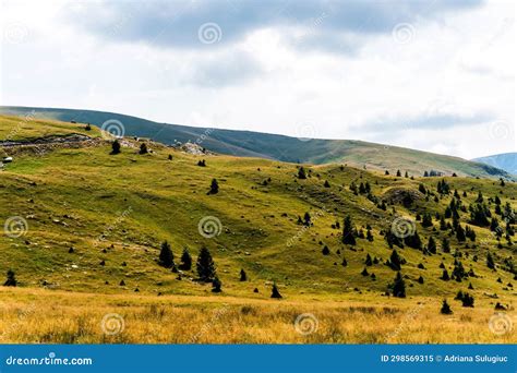 Landscape With Mountains Green Hills And Cloudy Sky Stock Image