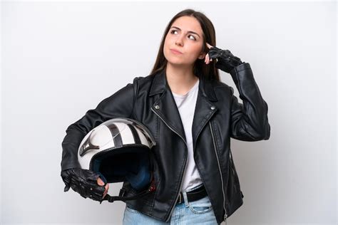 Chica Joven Con Un Casco De Motocicleta Aislado Sobre Fondo Blanco Que