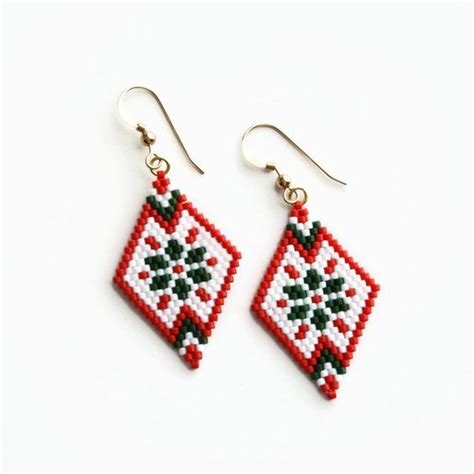 Red White And Black Beaded Earrings With Green Leaves