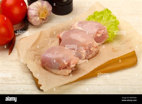 Boneless Raw Chicken Thighs Ready For Cooking Stock Photo Alamy