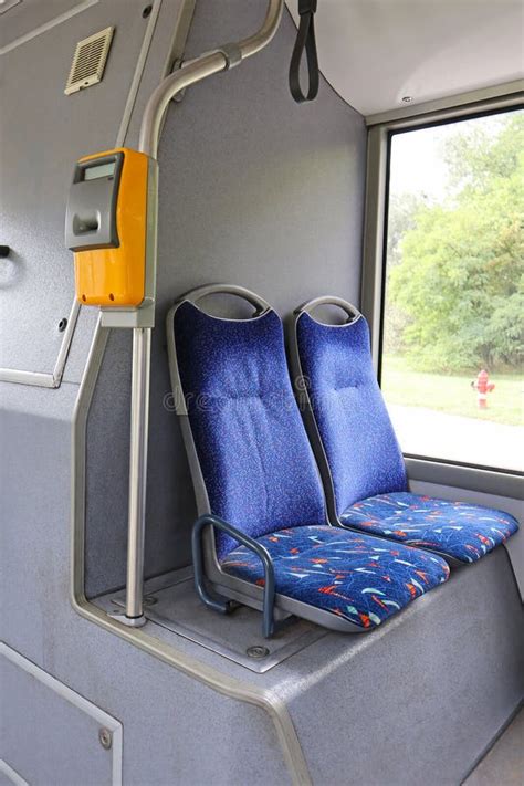 Empty seats of the bus stock photo. Image of commercial - 256143332