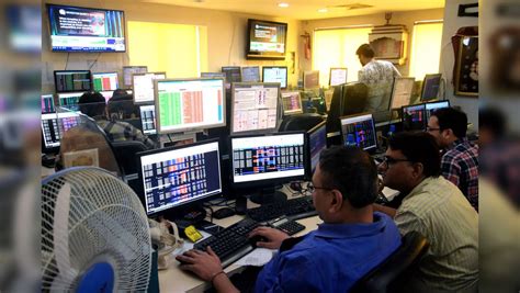 Sensex Nifty Trade Flat Amid Mixed Global Cues Auto Stocks Gain