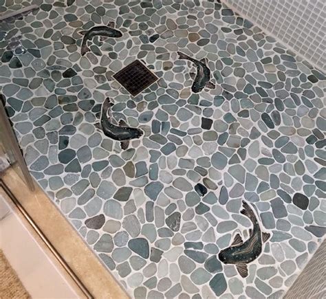 Beautiful Blue Green Gray Sliced Pebble Shower Floor With Sea Bass