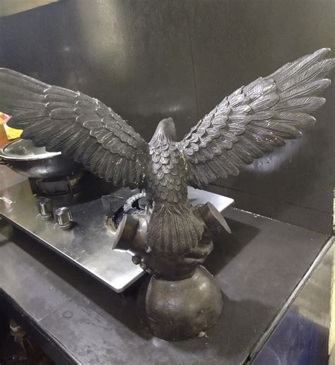 Brass open wings eagle statue display on Carousell