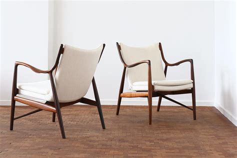 Finn Juhl A Pair Of Nv Chairs In Rosewood For Niels Vodder For