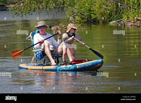 Grandpa And Granddaughter Float The Deschutes River In Bend Oregon On
