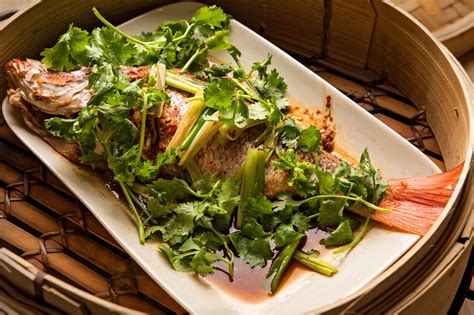 Steamed Whole Fish With Ginger And Sesame Recipe Nyt Cooking