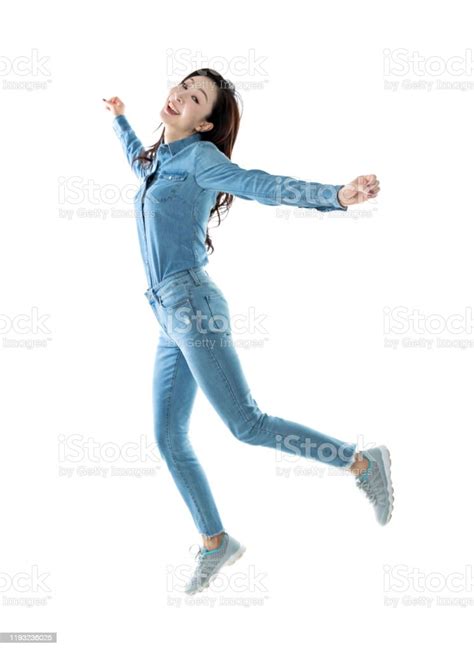 Excited Woman Jumping On White Background Stock Photo Download Image