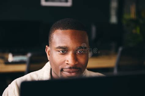 Young Black Male Advertising Marketing Or Design Creative In Office Sitting At Desk Working On