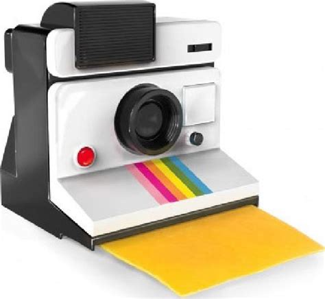 "Полароид" - это... Фотоаппарат с мгновенной печатью от фирмы Polaroid ...