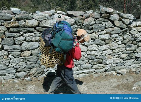 Boy-porter in Nepal stock image. Image of extreme, trekking - 823681