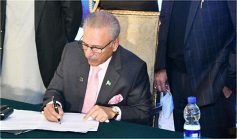 President Alvi Signs Army Act Amendment Official Secrets Act Bills