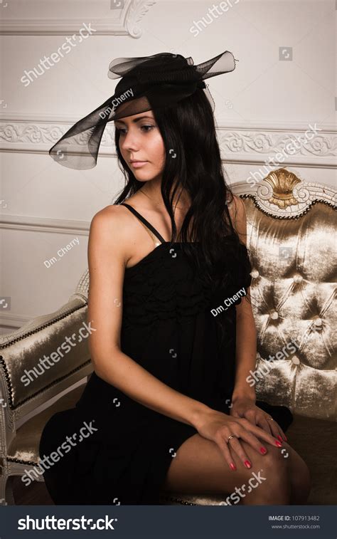 Attractive Brunette Sitting On Couch Boudoir Stock Photo Shutterstock