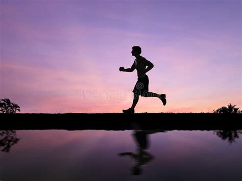 Silhouette Man Jogging Stock Photo Image Of Energetic 82091174