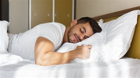 Young Man Peacefully Sleeping In His Bed International Institute Of Sleep