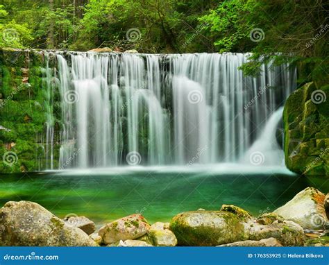 Waterfall in forest stock image. Image of falls, stone - 176353925