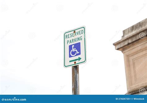 Blue Handicap Sign On The Street A Symbol For Mobility Aid For People