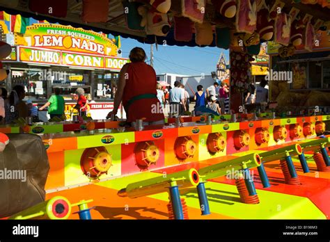 Booth Arcade Game Operator Woman Hi Res Stock Photography And Images