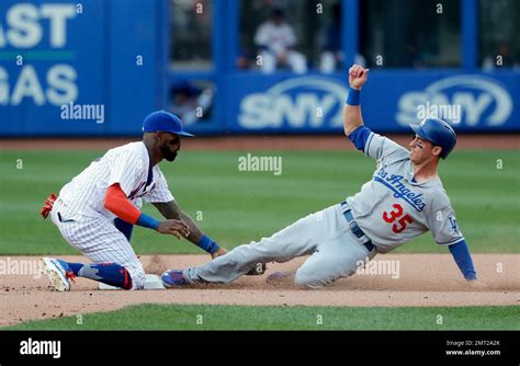 New York Mets Shortstop Amed Rosario Left Just Misses Putting The Tag