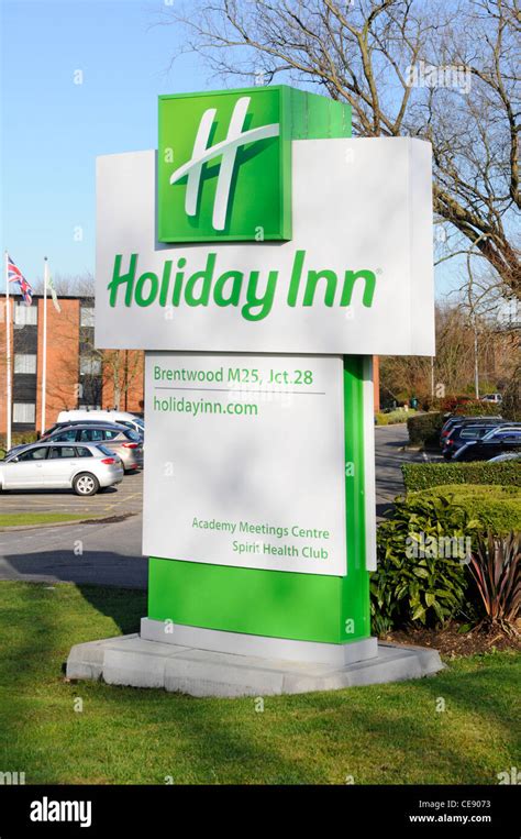 Holiday Inn Hotel Sign With Health Club And Meeting Centre At Junction