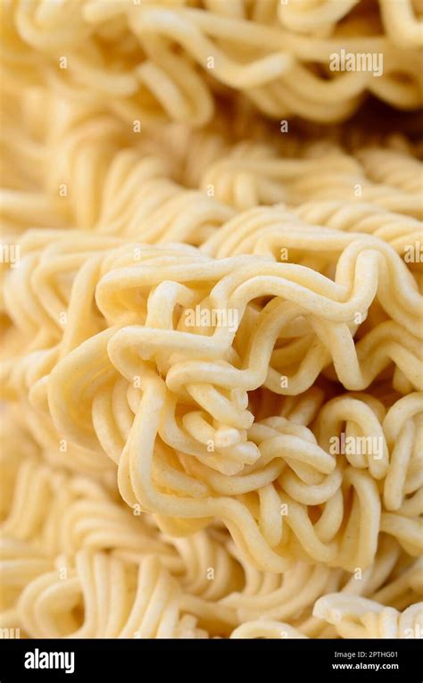 Close Up View Of Yellow Dry Instant Noodles Chinese Traditional Food