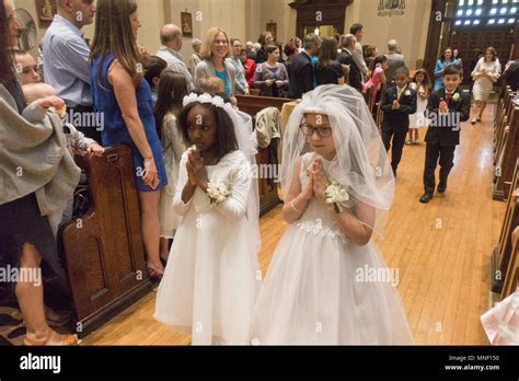 First Holy Communion ceremony for children at a Catholic Church in Brooklyn, New York Stock ...