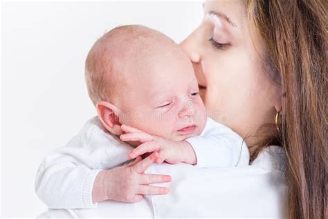 Mother And Her Newborn Baby Together Happy Mother And Baby Kissing And