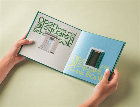 Hand Holding Hardcover Open Book Free Mockup Mockup World HQ