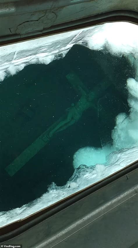 Giant Crucifix At The Bottom Of Lake Michigan Draws Revelers And Worshipers From Across The