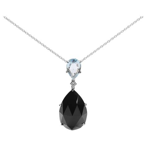 18K White Gold Diamond Accent And Blue Topaz And Sky Blue Topaz Pendant