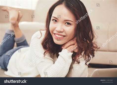 Attractive Asian Girl Lying On Floor ภาพสต็อก 1125672347 Shutterstock