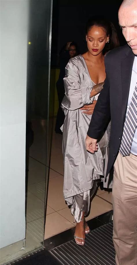 Rihanna Slips Into Slinky Silver Dress For Night Out In London After