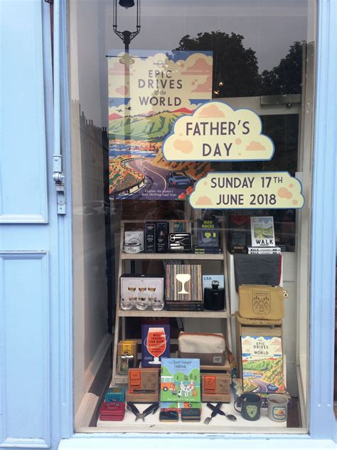 Father's day outdoorsy window display | Charity shop display ideas