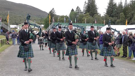 Ballater Pipe Band March Out Of The Highland Games Park On The Eve Of