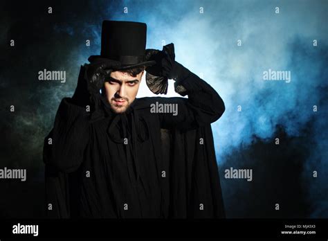 Black Hat And Cloak High Resolution Stock Photography And Images Alamy