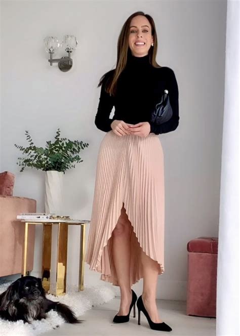 Sydne Style Shows How To Wear A Turtleneck With Pleated Skirt For